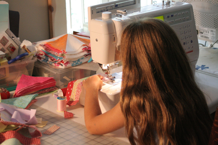 kid using a best kids sewing machines